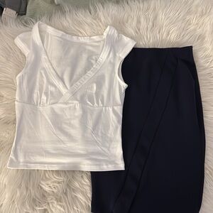 White shirt and a blue pencil shirt Zara/trafaluc
Salling both